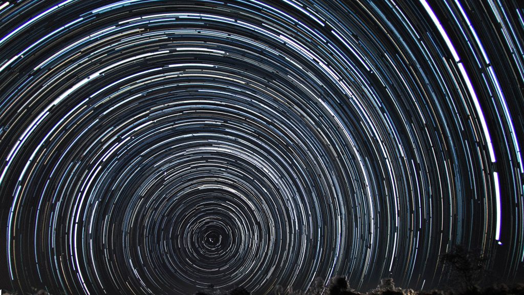 A very long time exposure of the stars in the sky.